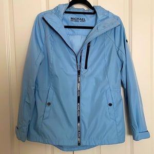 Michael Kors light blue rain coat with hood. Size Small